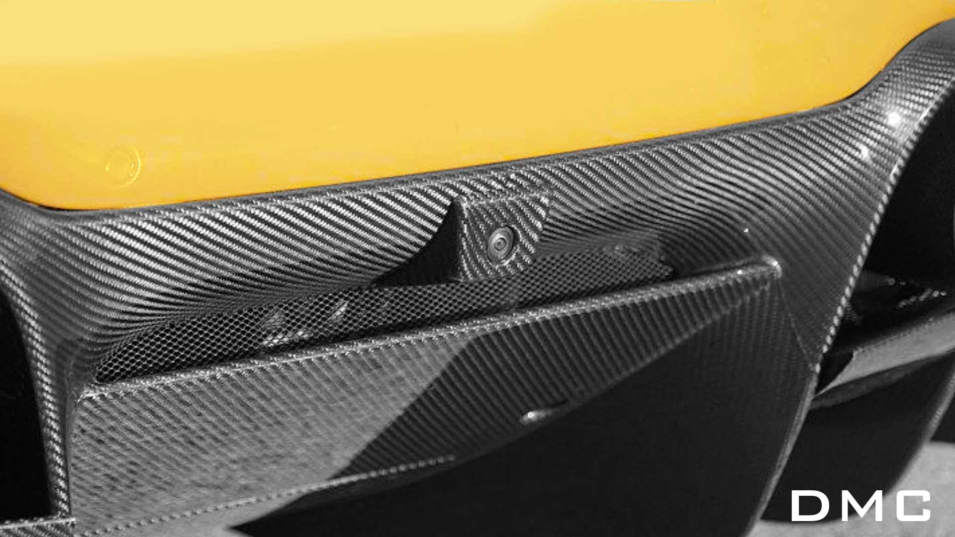 DMC Ferrari F8 Tributo Forged Carbon Riber Rear View Camera Cover fits the OEM Rear Bumper of the Coupe & Spider